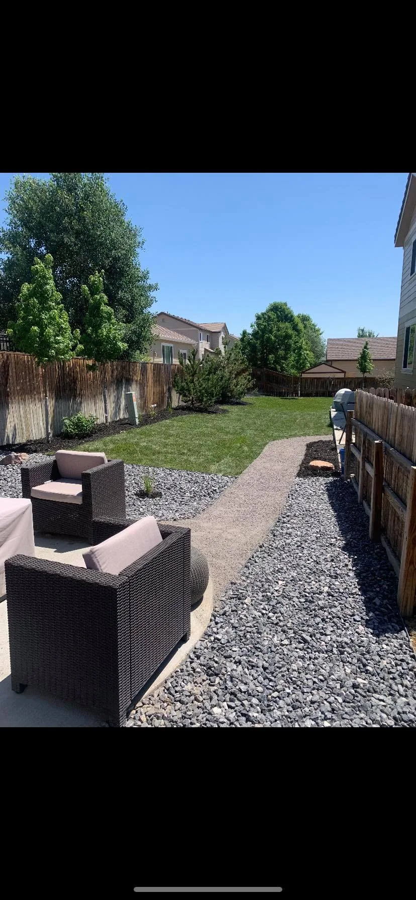 Custom landscape design with lawn and garden beds in Denver CO by Flores Sprinkler & Landscape